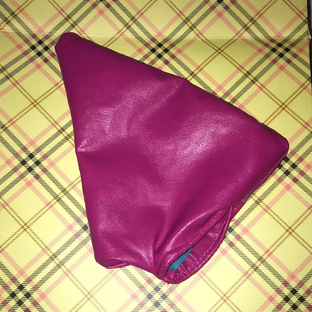 Pink sludge clutch by Franky Doodlez